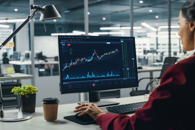 Analyst reviewing market data